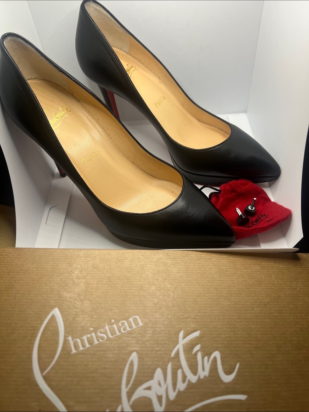 Christian Louboutin Black Leather Pointed Pumps with Signature Red Sole